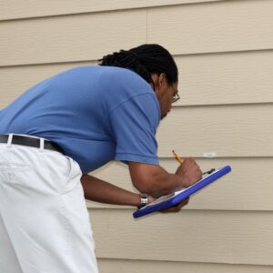 person performing a home inspection